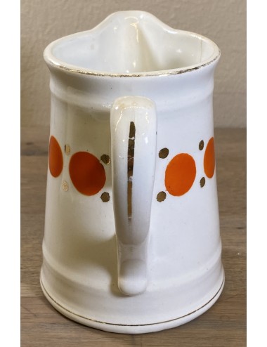 Milk jug - Petrus Regout - decoration of orange spheres