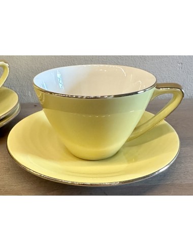 Cup and saucer - Boch - model SATURN/MIAMI (1957-1962) - décor in ochre yellow with gold handle