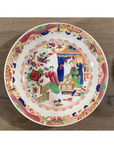 Kommetje met schoteltje - ongemerkt (Engeland?) - deels handgeschilderd Chinees décor in roze, groen en blauw
