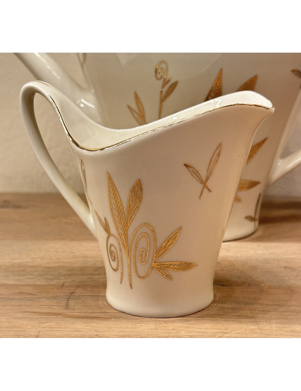 Milk jug - porcelain - Seltman Johann Bavaria - décor in cream with gold accents and leaves in gold color