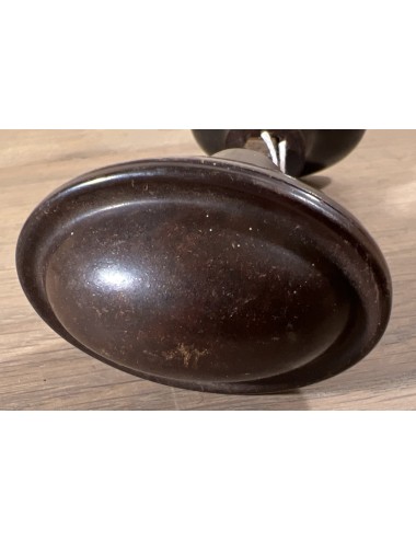 Double door knob in brown bakelite finish