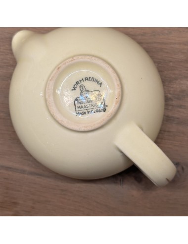 Milk jug - Petrus Regout - shape REGINA - décor in cream with gold finish