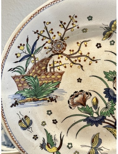 Plate / Decorative plate - Boch Frères - décor with a flower vase, bird and butterflies in yellow/green/blue