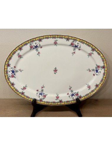 Plate - larger oval model - Limoges B & Cie (Balleroy) - décor in yellow - made for/sold by A. Tytgad