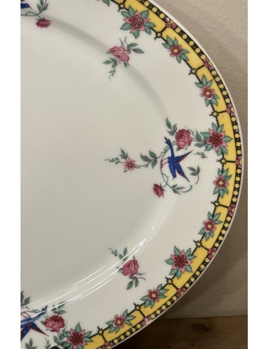 Plate - larger oval model - Limoges B & Cie (Balleroy) - décor in yellow - made for/sold by A. Tytgad