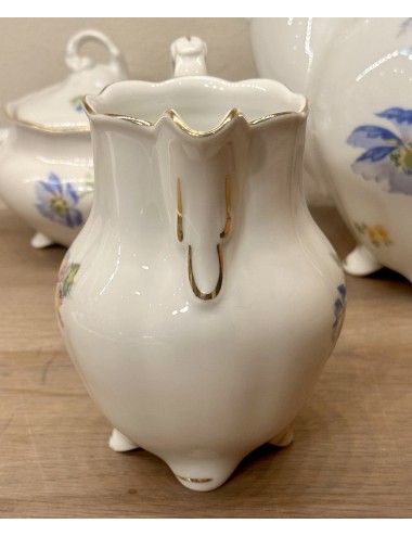 Milk jug - Königszelt (Poland) - model on legs with a décor of yellow/pink flowers