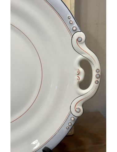 Bottom dish of a (soup) tureen - Petrus Regout - with city angel stamp - décor of a light blue border with orange and black line
