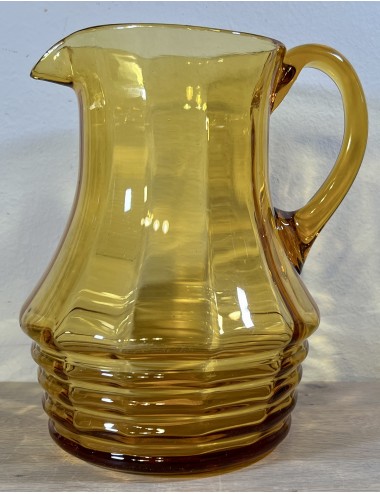 Water jug / Pouring jug - dark yellow glass with ribbed bottom and side