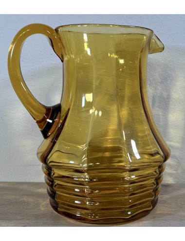 Water jug / Pouring jug - dark yellow glass with ribbed bottom and side