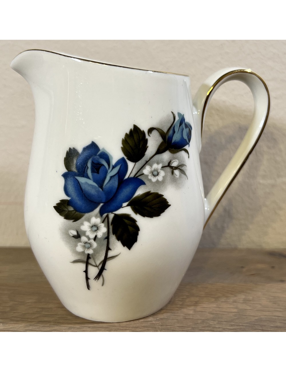 Milk jug - porcelain - Wunsiedel Bavaria - décor in white with blue with white flowers