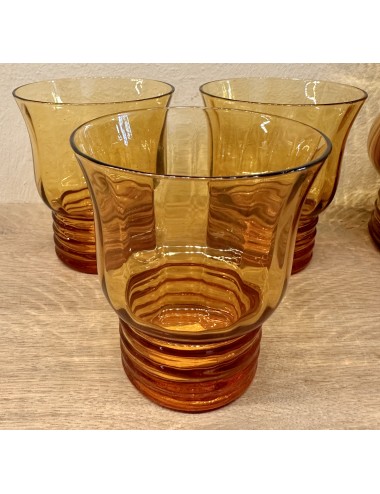 Drinking glass - executed in brown glass