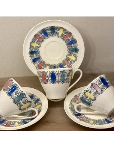 Cup and saucer - Petrus Regout - dated 1967 - décor black/yellow/green/blue/red