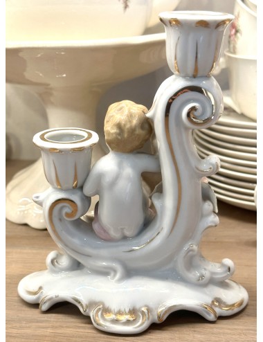 Candlestick - double holder - seated boy with roses and white/gold decoration