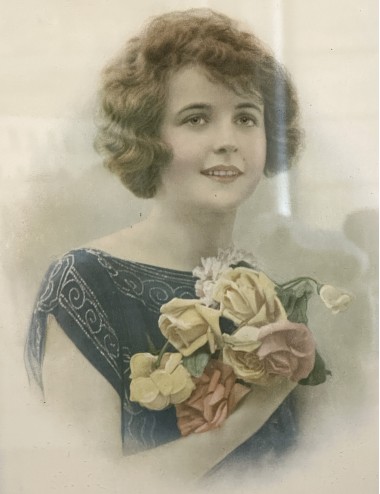 Print of woman with roses in gold frame