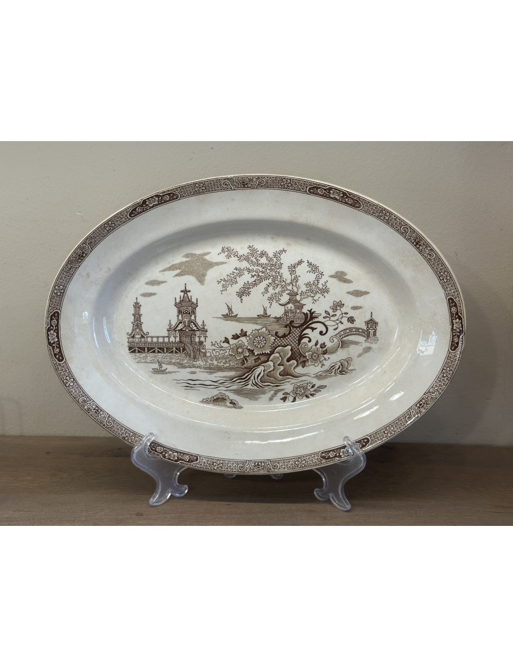 Plate - oval model - Gustavsberg - décor GONGGONG executed in brown