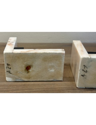 Bookends - 2 pieces - executed in a white/pink marble base with black and squirrels in spelt (metal)