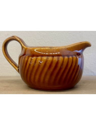 Milk jug - Boch - shape TRIANON executed in brown color