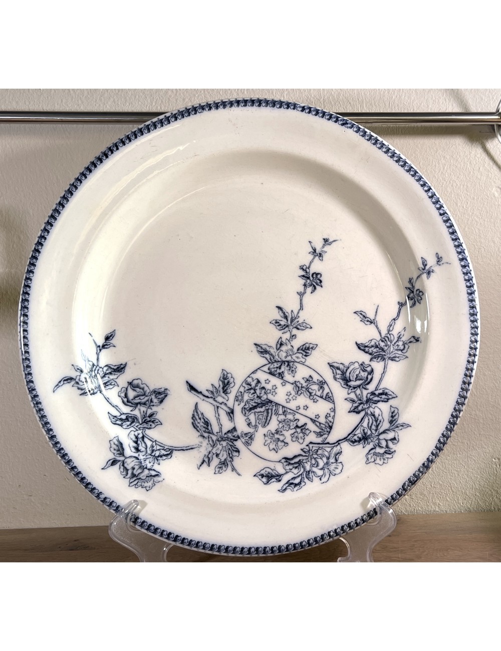 Plate - flat round model - Faiencerie de Jemappes - décor of roses/wild roses in flowing blue