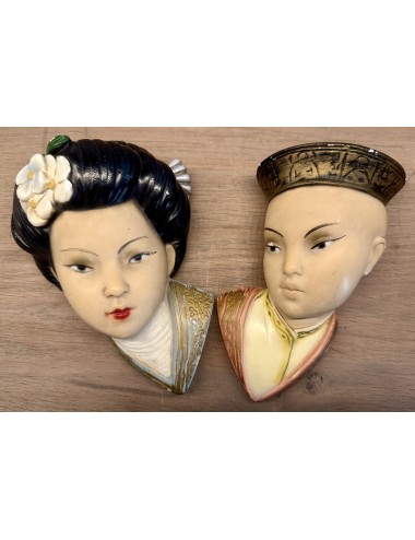 Plaster wall decoration couple - image of a Chinese man and woman