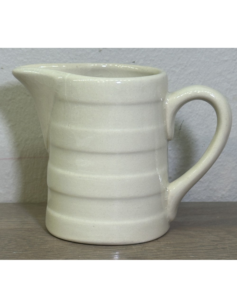 Water jug / Milk jug - small model - Boch Frères -executed in creamy white/beige