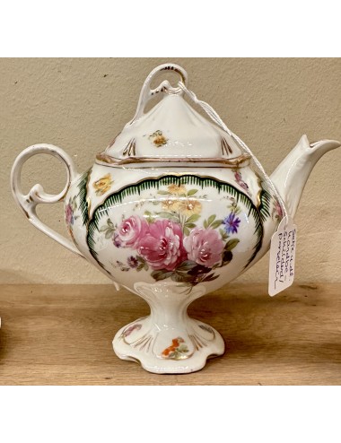 Set, 4-piece, in porcelain of a coffee or tea pot on foot, milk jug and 2 cups and saucers