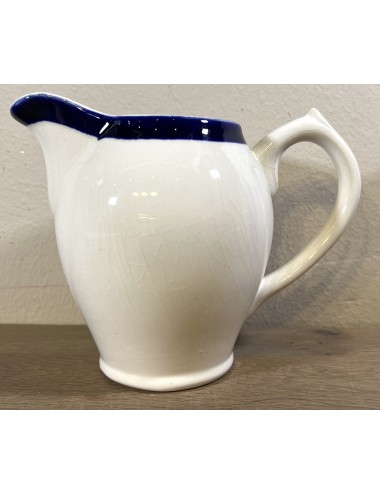 Milk jug - Boch - form PARIS - décor executed in cream/white with (dark) blue/royal blue rim