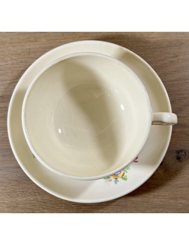 Cup and saucer - larger model - unmarked but Petrus Regout - shape BOUDEWIJN(?) - décor with colored flowers