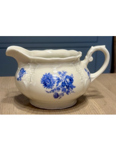 Milk jug - Mosa (mark with 5 arches, ca. 1940-1950) - model BAROCK - décor of flowers in blue
