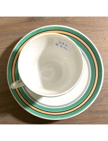 Cup and saucer - Societe Ceramique Maestricht - décor in green working with lustre fillet